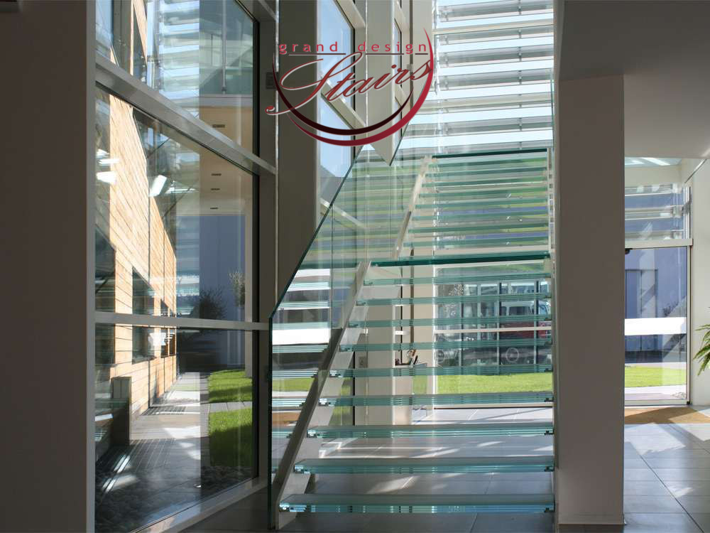 Glass staircase satin glass steps clear glass balustrade London Stairs Bond Street