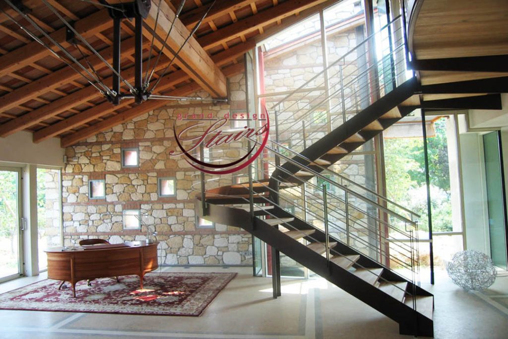 Steel staircase with stainless steel railing