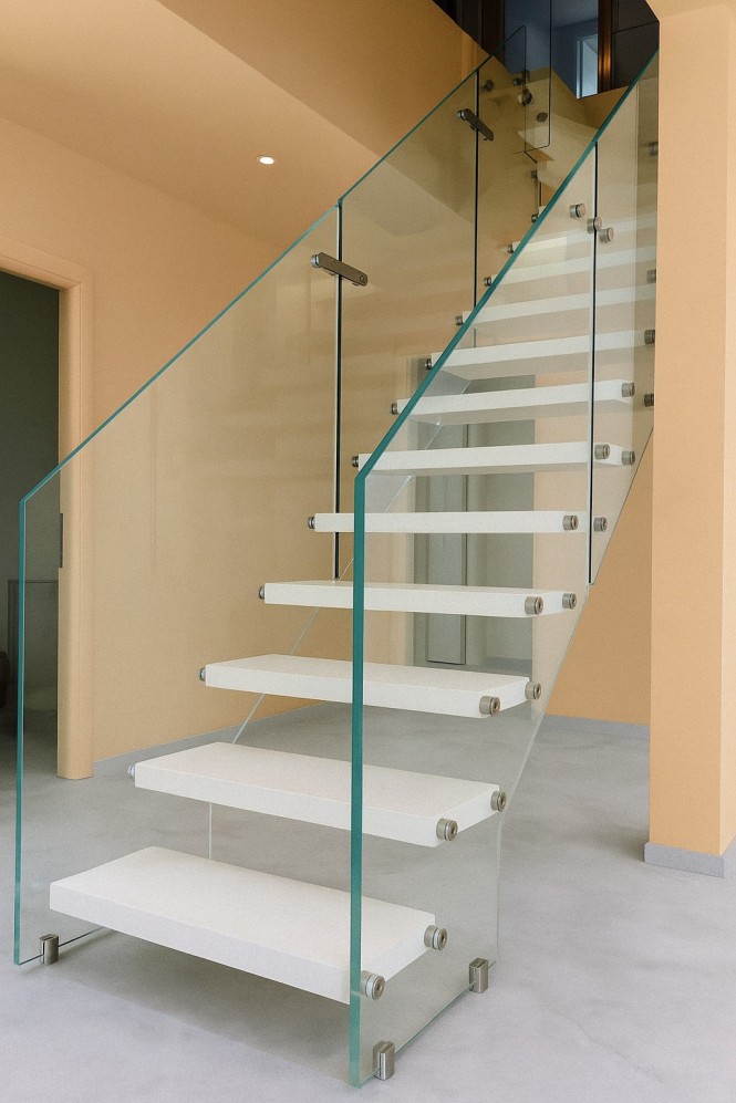 floating staircase with glass railing