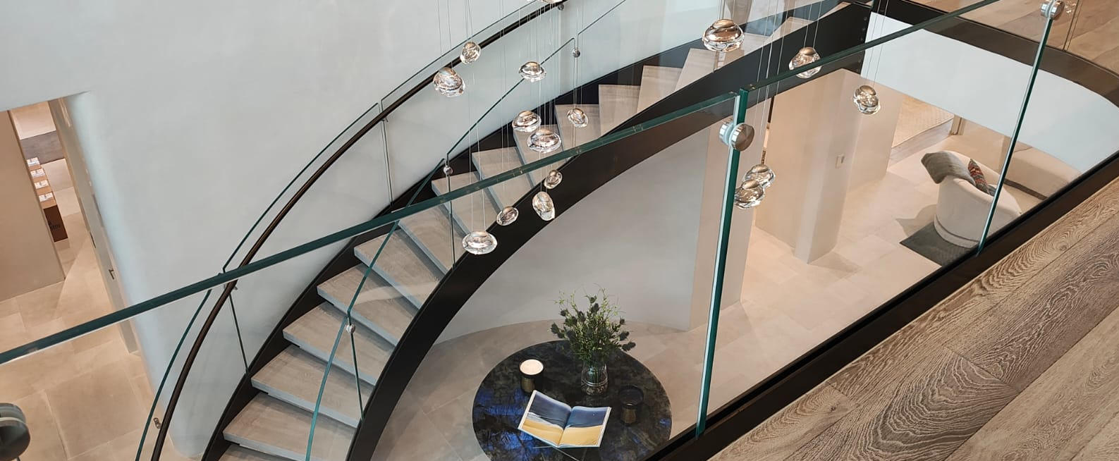 Luxury curved staircase glass and steel