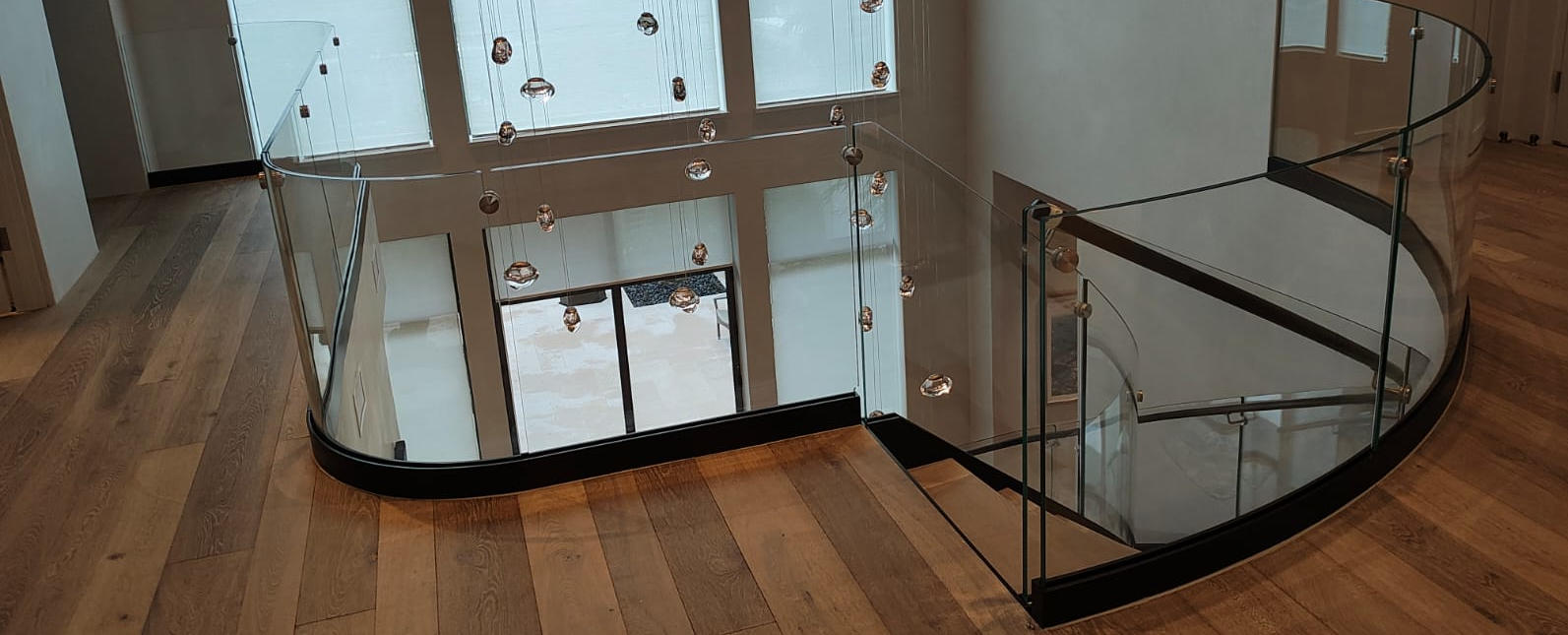 curved glass balustrade top florr mounted