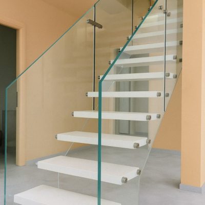 floating staircase with glass railing
